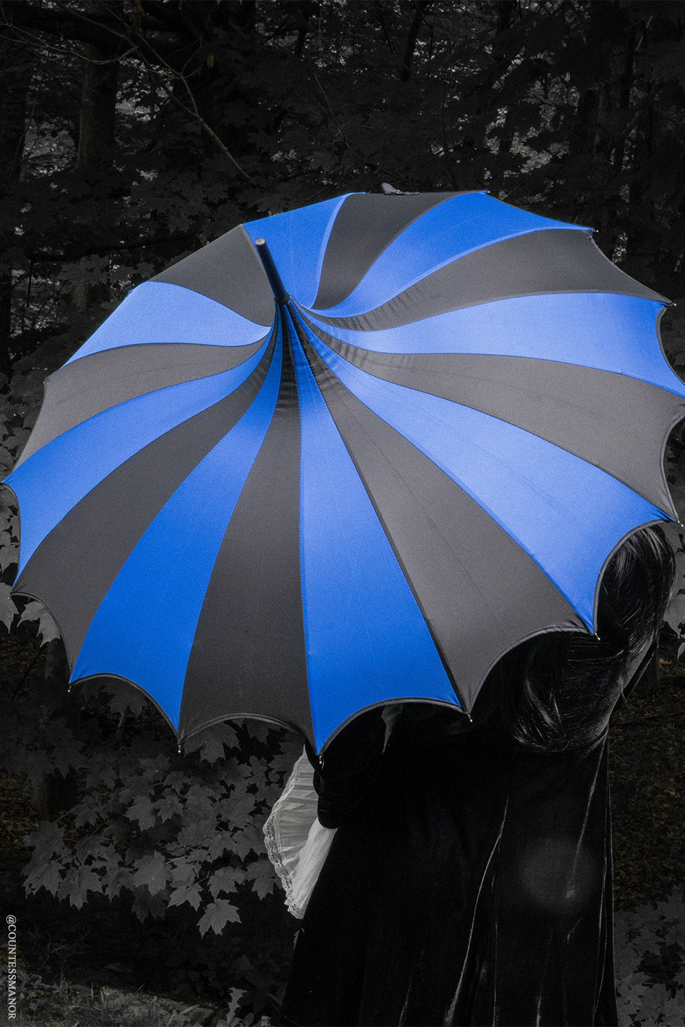 spooky striped umbrella with batwing edge