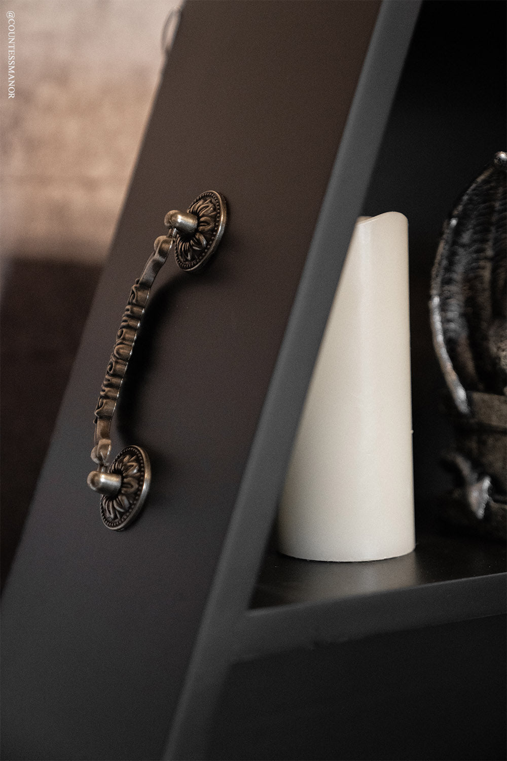large coffin shelf with gothic hardware