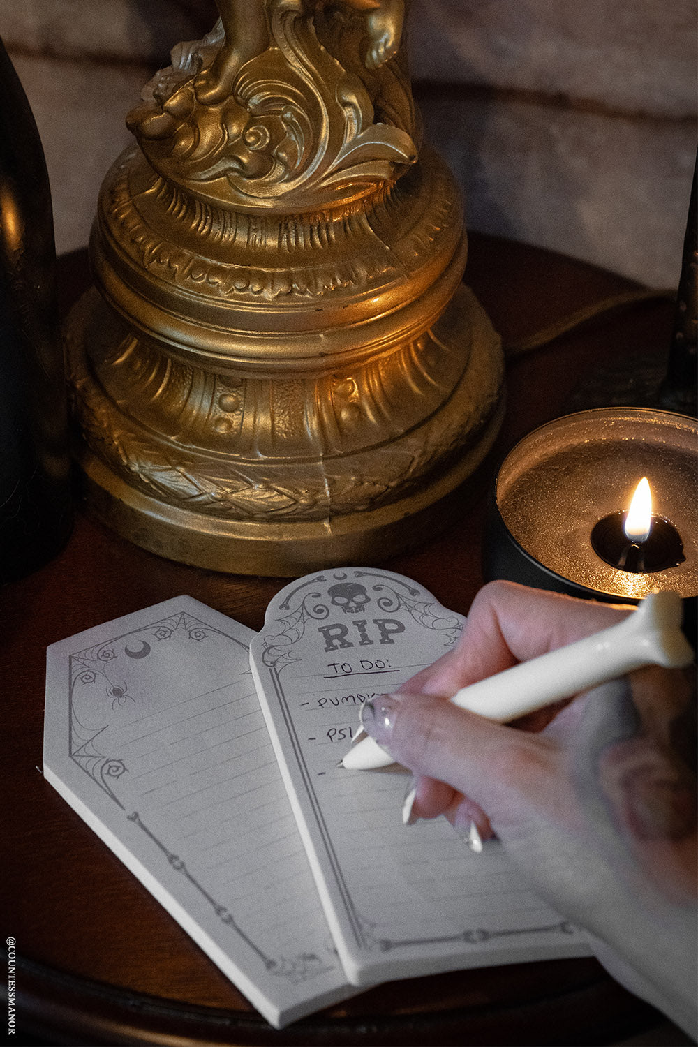 coffin shaped sticky note and tombstone shaped sticky note pad