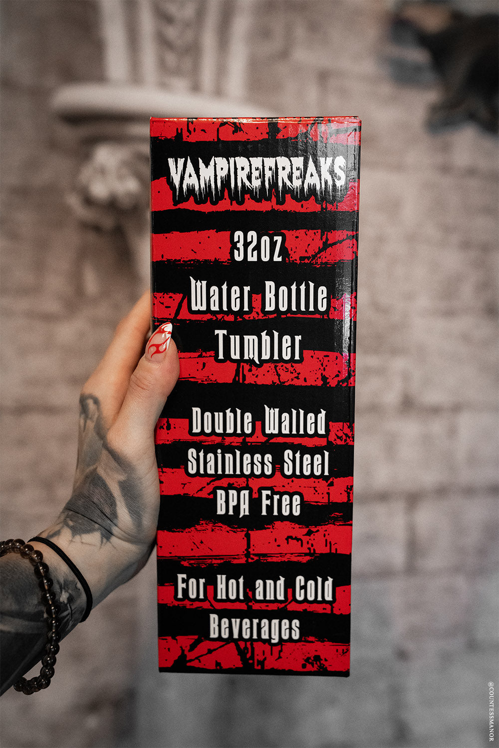 distressed gift box with a 32 oz large gothic water bottle inside