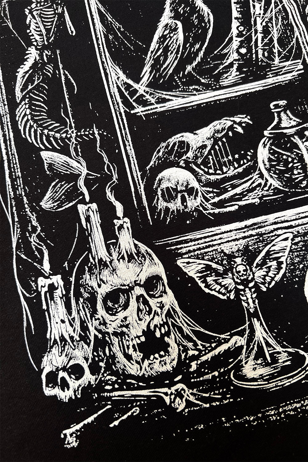 mermaid skeleton, taxidermy raven, bat, skull, and spiderweb sweatshirt