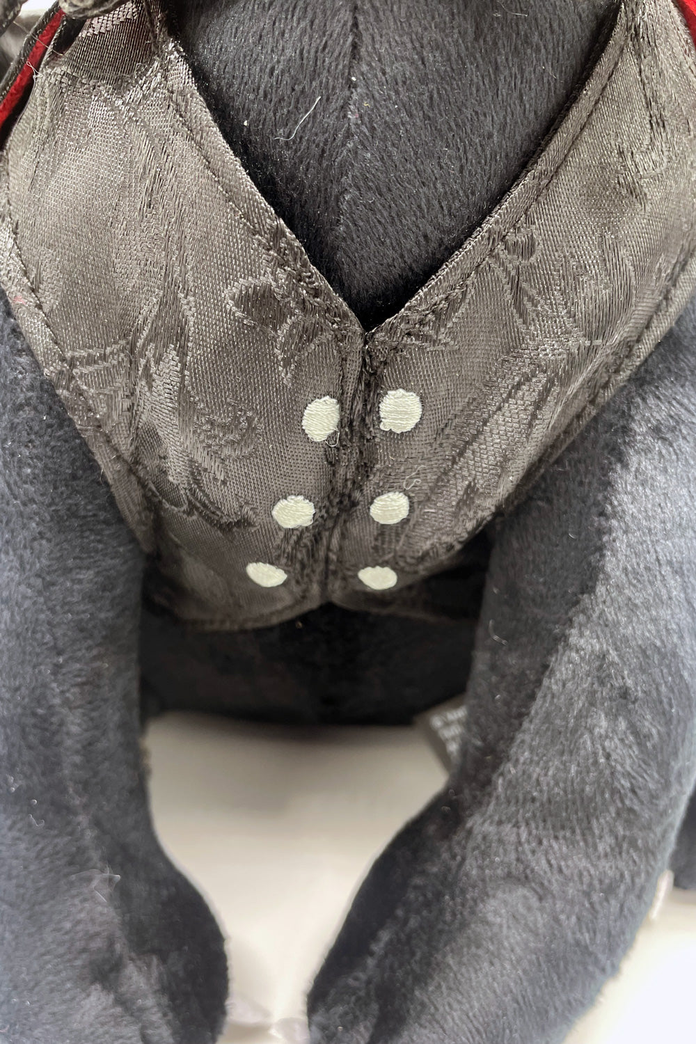 goth cat stuffed animal wearing black brocade vest