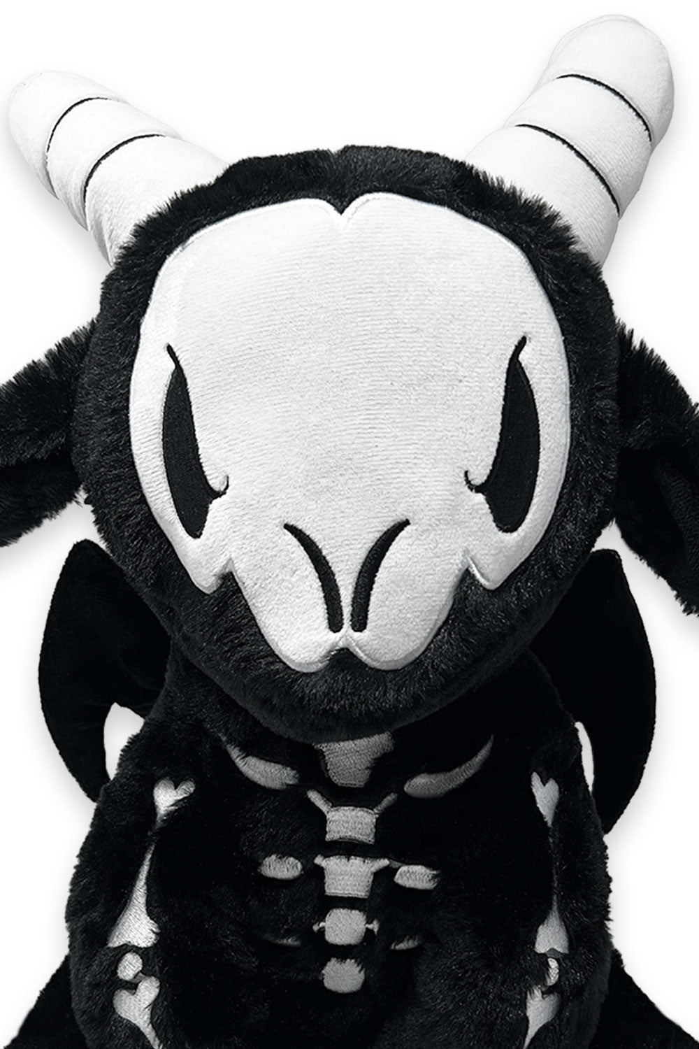 skeleton goat plush toy with horns and batwings