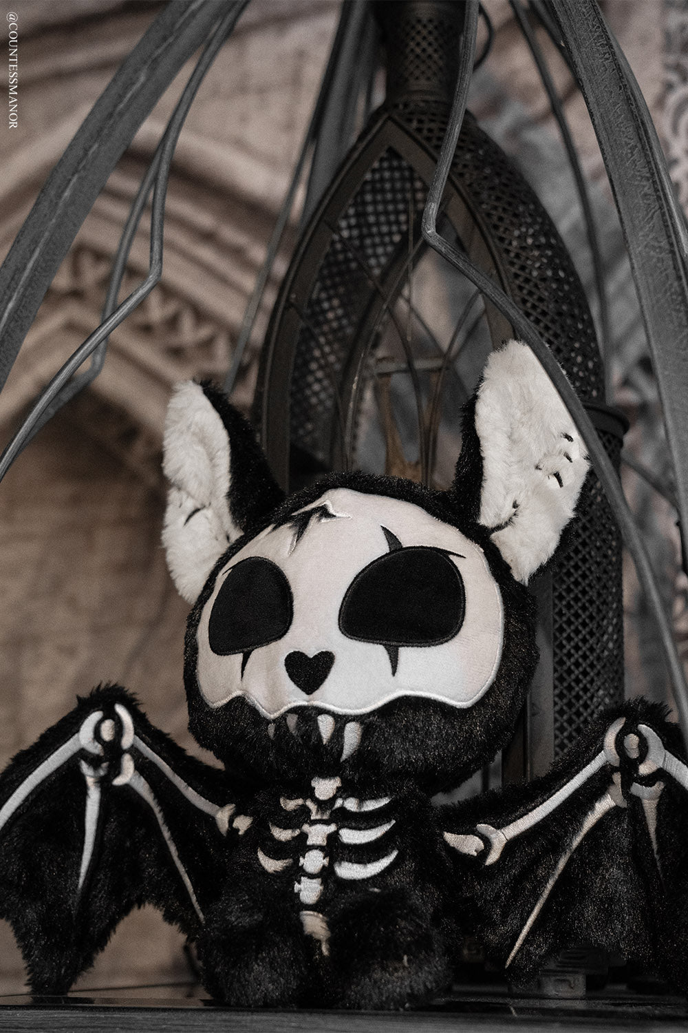 embroidered skeleton bat plushie with fangs and bat wings
