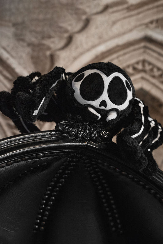 black skeleton plush toy