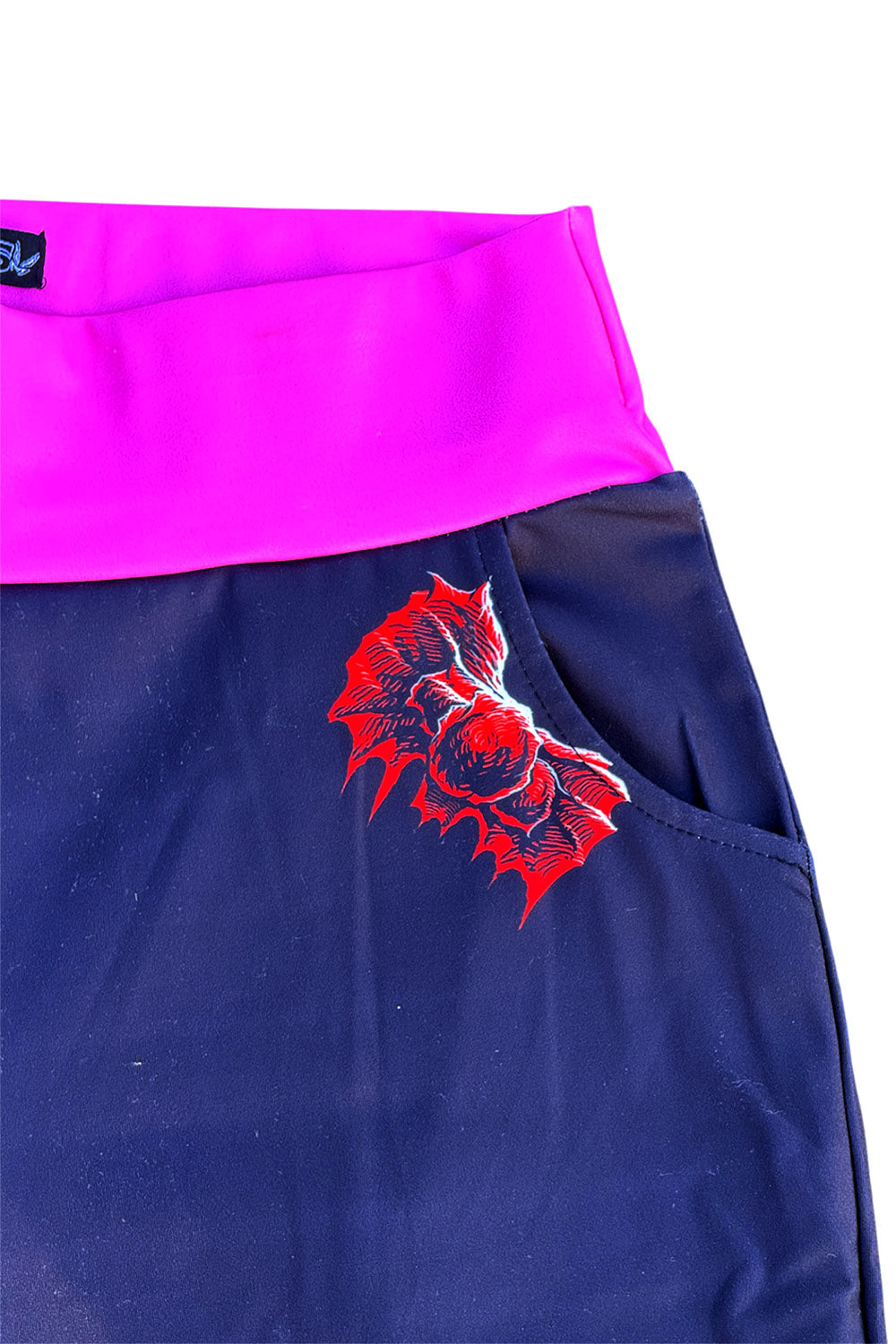 womens black and pink striped flares with bows