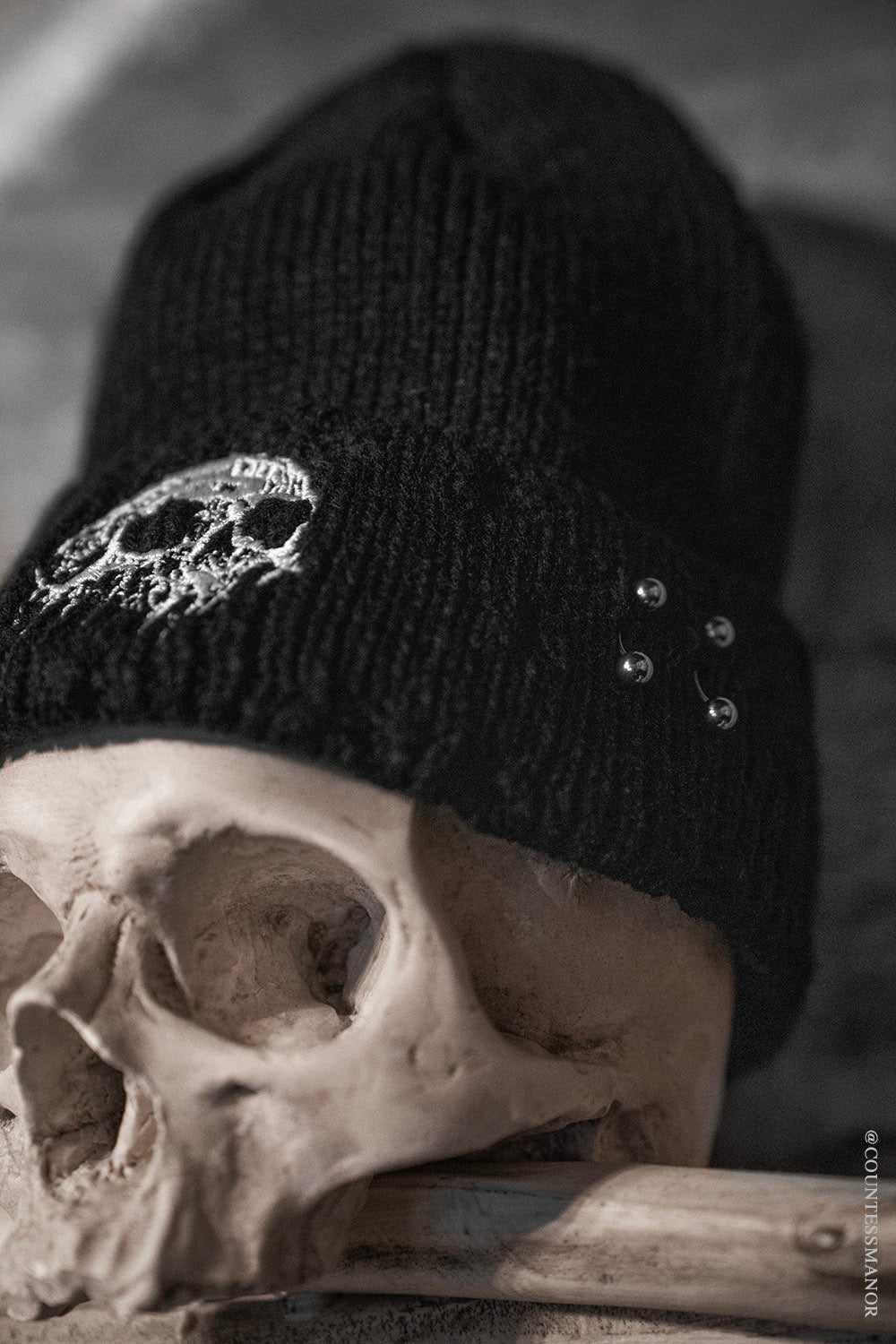 gothic skater beanie hat with embroidered skull 