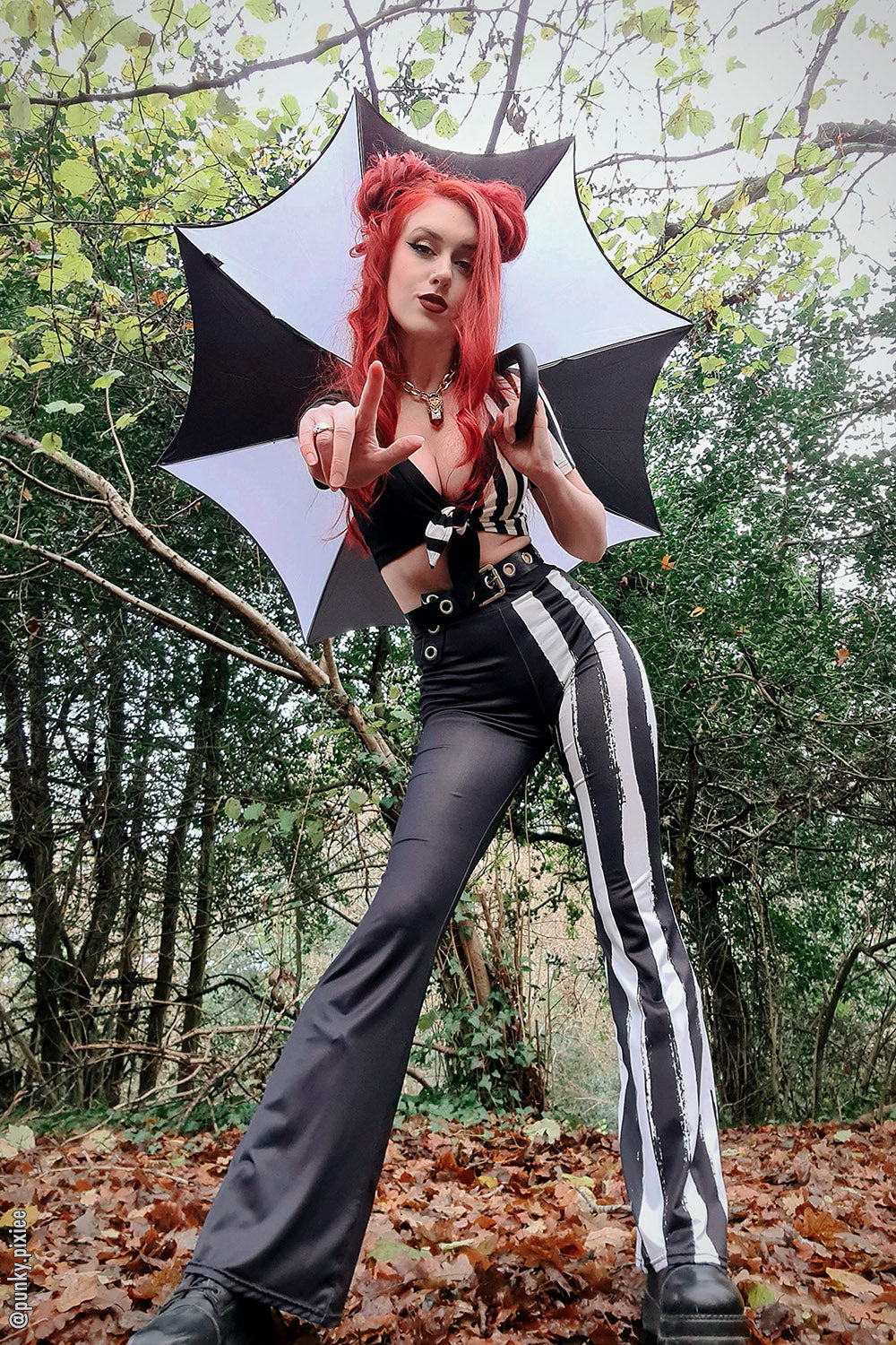 womens emo high-rise distressed black and white striped flared leggings with pockets