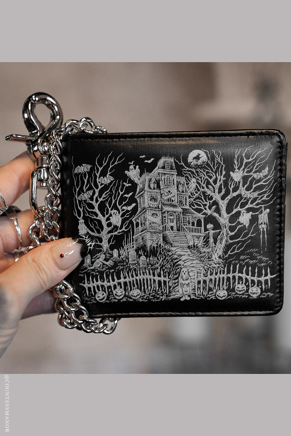 haunted mansion wallet made of vegan leather 