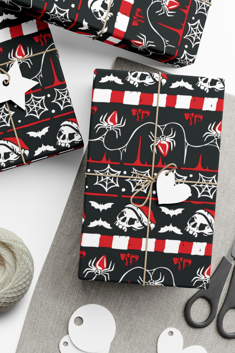 spooky xmas skull, spider, goth santa claus hat, bat, and web christmas wrapping paper