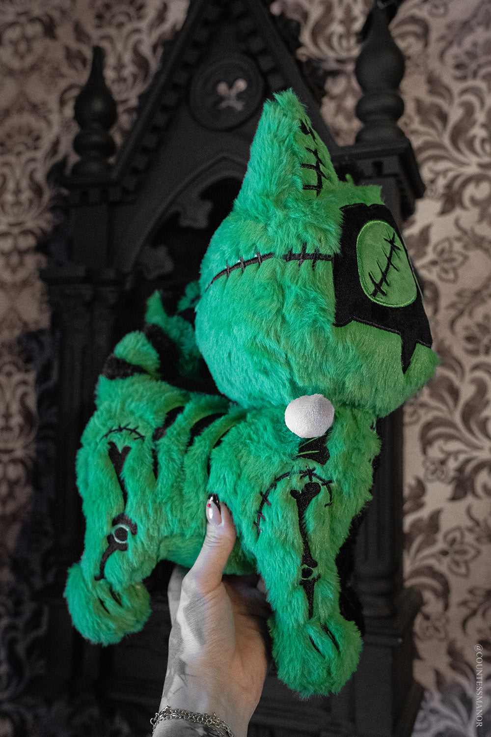 green and black frankenstein cat parody plush toy