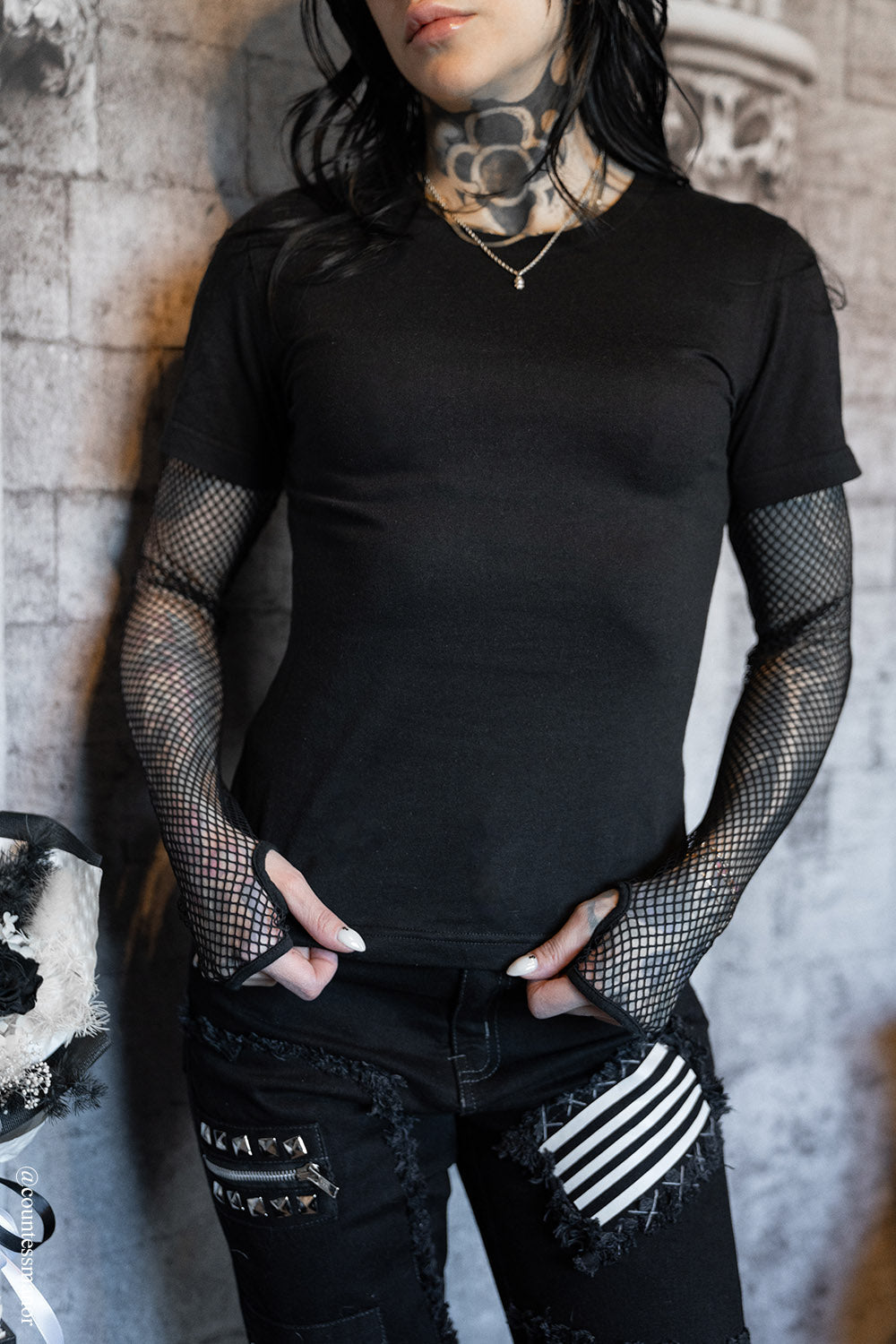 womesn emo fishnet long sleeve top and attached black shirt with thumbholes 