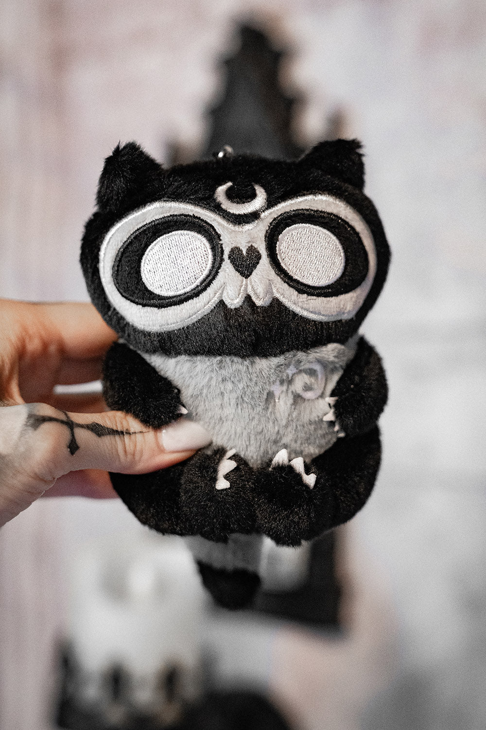 raccoon embroidered plushie