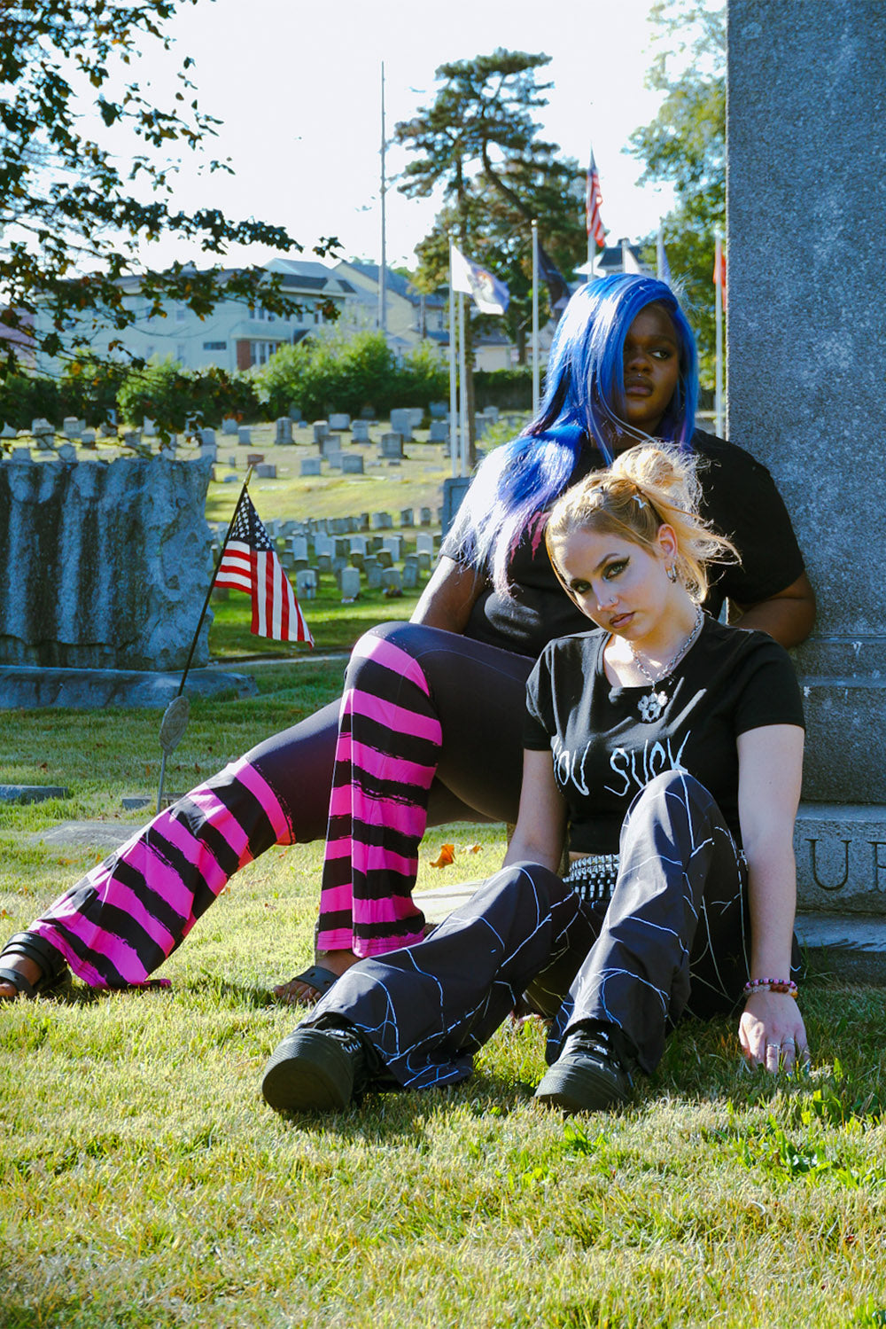 plus size womens black and hot pink striped flared leggings with pockets