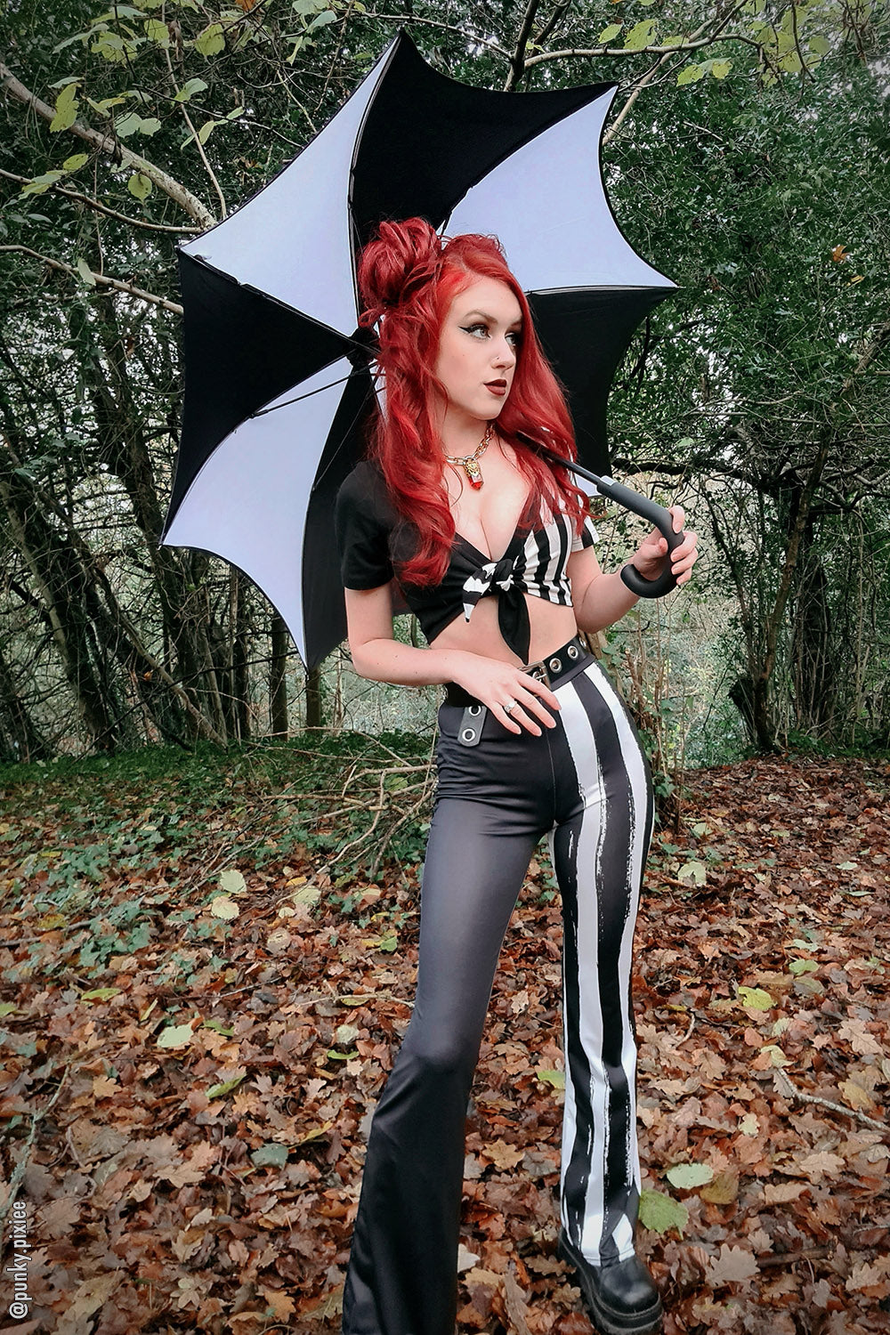 womens emo distressed black and white striped flared leggings with pockets